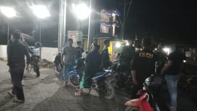 Koramil Marbo Gandeng FKPPI, Linmas, dan Tokoh Masyarakat Gelar Patroli Bersama di Mangarabombang